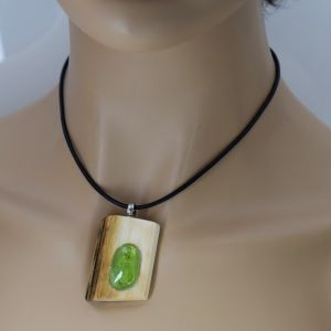BONA ROCA Anhänger aus fossilem Mammut Elfenbein Stoßzahn mit großem facettiertem Peridot Sterling Silber M4860